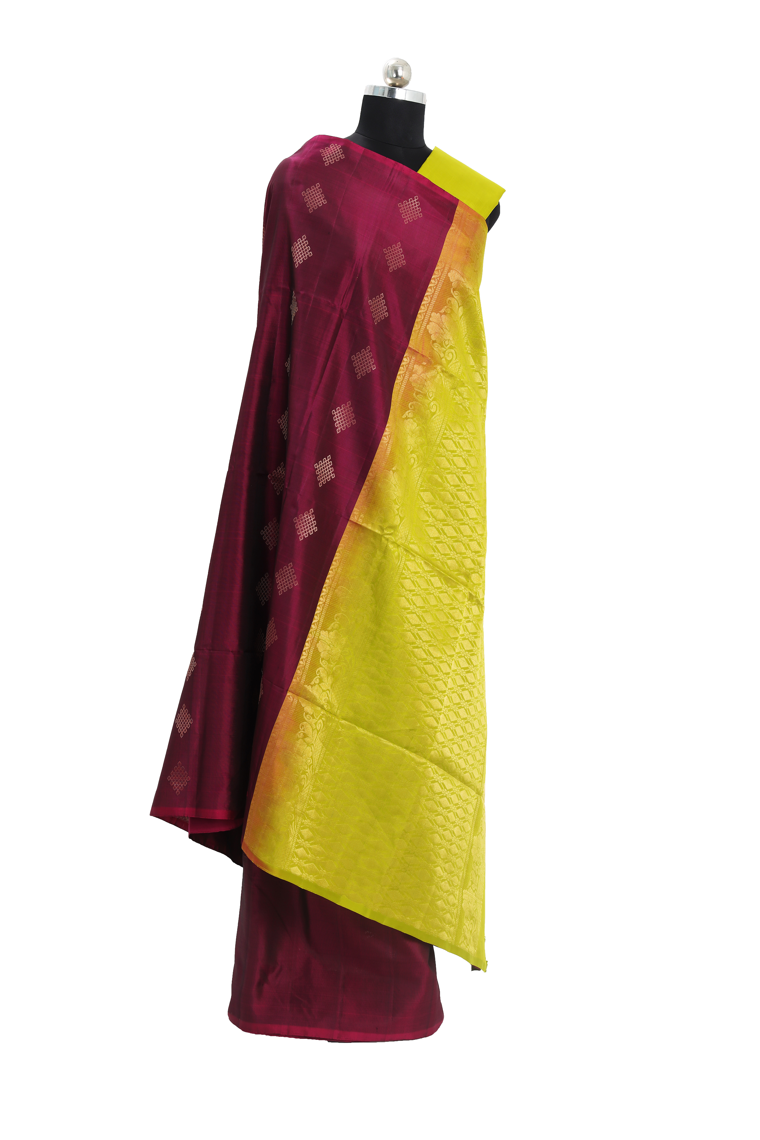 Magenta with parrot green kolam motifs